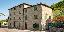 Porzione di casa in sasso con terreno a vigo
