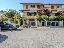 Villetta a schiera con giardino privato, 4 balconi e garage